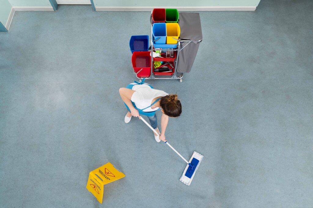 woman mopping floor_shutterstock_382927066